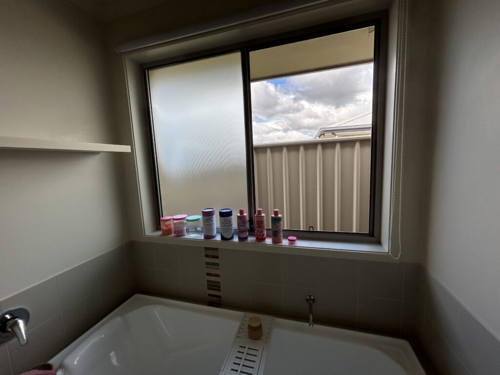Bathroom window and tiled wall cleaned during deep cleaning service – Albury NSW