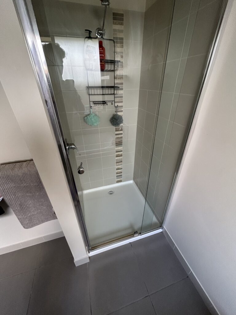 Glass shower and tiled walls scrubbed and polished – deep cleaning Albury NSW
