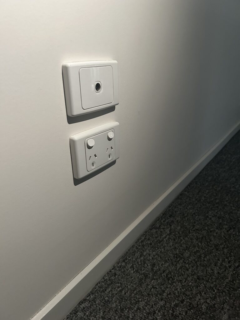 Power outlet and wall switches wiped and polished during end of lease cleaning – Wodonga VIC